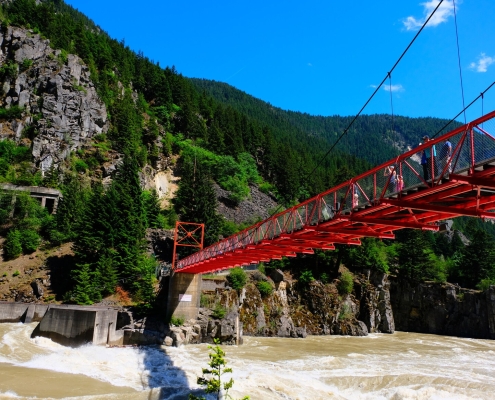suspension bridge with rushing river